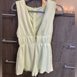Light yellow Princess Polly romper.